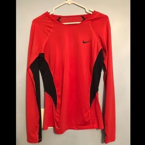 Red/pink woman’s Nike athletic top (like new)